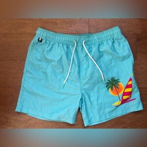 Blue Swim Shorts with Tropical Print